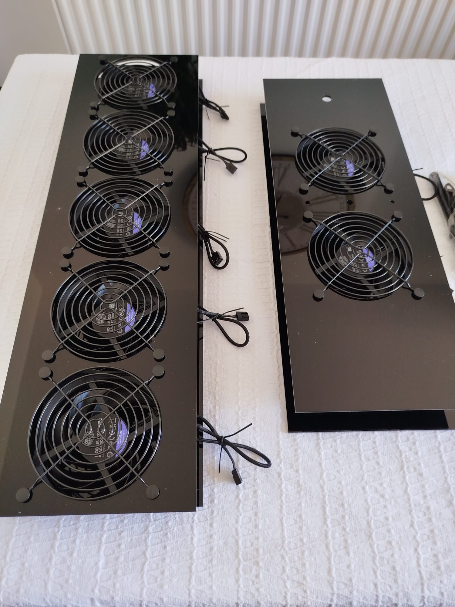 Luggable Fan Panel Obsidian — front view both variants