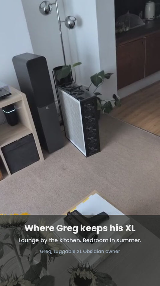 Greg, a Luggable XL Obsidian owner, shows where he keeps it — lounge by the kitchen, bedroom in summer. Captioned video.